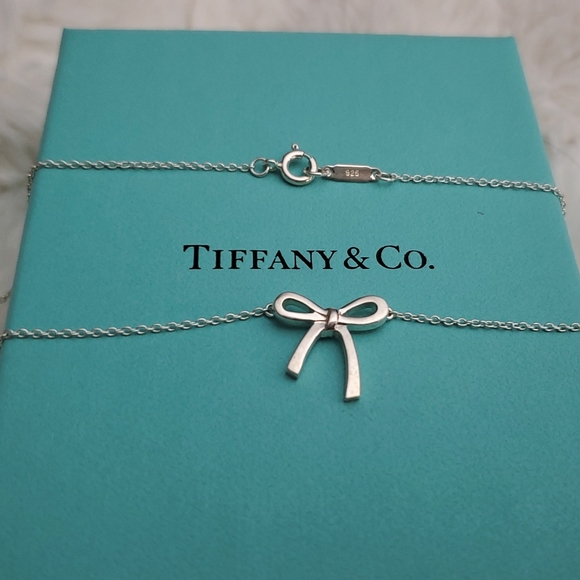 Tiffany & Co. Jewelry - RETIRED Tiffany Mini Bow Pendant Necklace